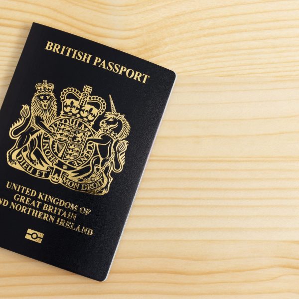 London, UNITED KINGDOM - AUGUST 17, 2020: New British passport edition after Brexit laid on desk, citizenship newsworthy